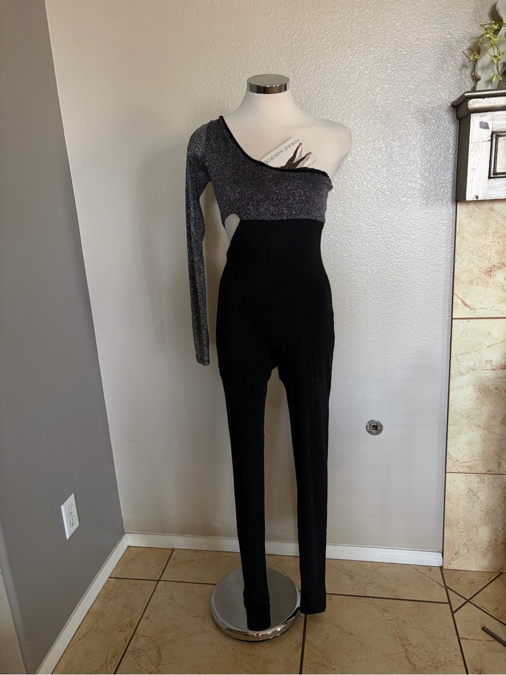 naked wardrobe Black and Silver One-Shoulder Jumpsuit